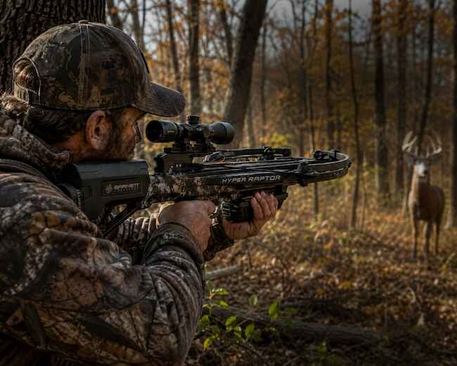 Hunter Shooting A Barnett Hyper Raptor T-Rex Crossbow Hunter Shooting A Barnett Hyper Raptor T-Rex Crossbow